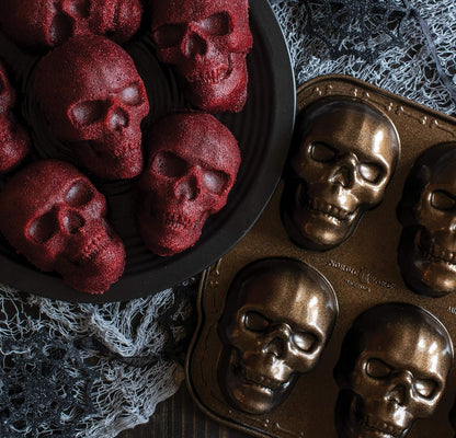 "Spooktacular Haunted Skull Cakelet Pan - Perfect for Halloween Baking!"