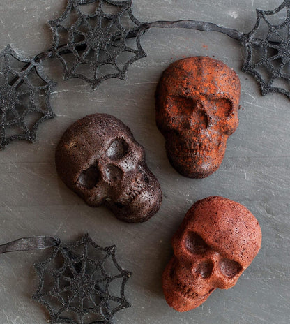 "Spooktacular Haunted Skull Cakelet Pan - Perfect for Halloween Baking!"